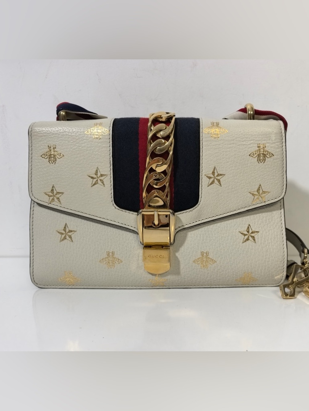 Gucci White Leather Shoulder Bag with Gold Bee & Star Motif and Navy-Red Web